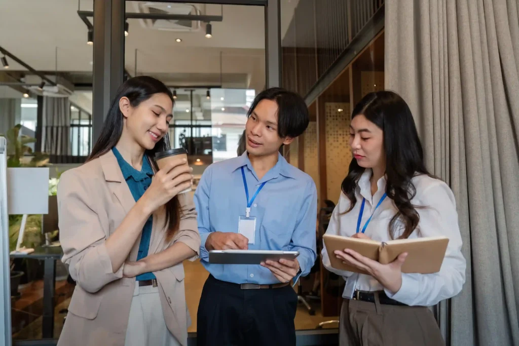 Corporate event planner in Singapore discussing an SME event budget