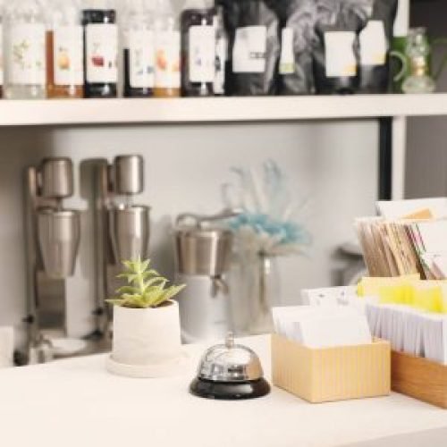 cafe-counter-with-flower-and-service-ring-bell-for-2023-11-27-05-15-36-utc-qyxetu8gmzmogqtonksjjcy21sb6lkmza9rpzwktko