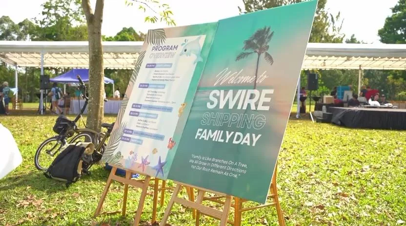 Swire Family Day welcome sign in an outdoor setting